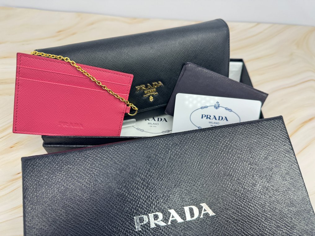 Prada saffiano flap Wallet Catawiki