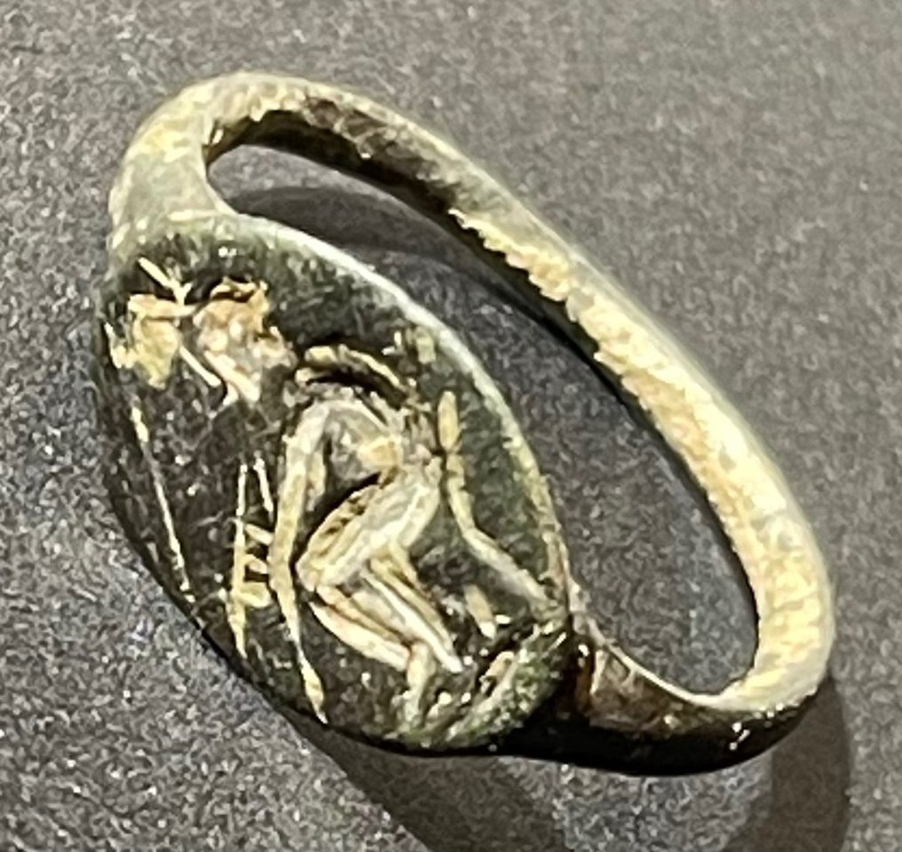 Ancient Greek Bronze Intact SealRing with an image of Apollo playing